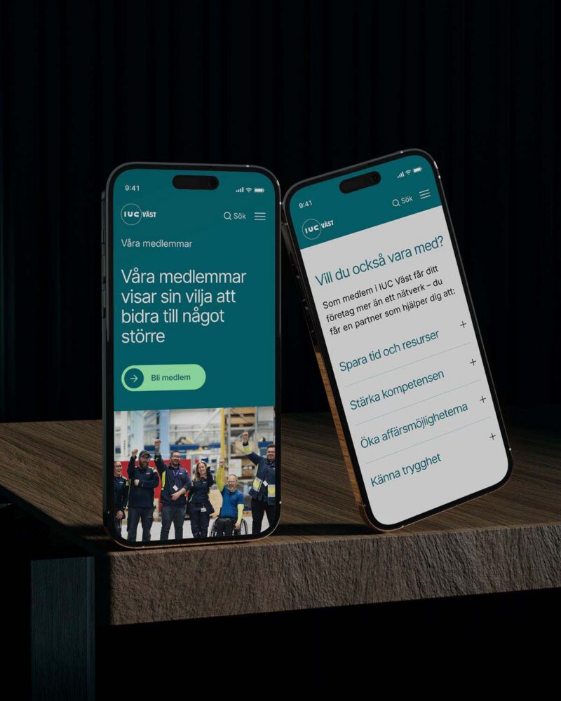 Två telefoner med IUC Väst's webbplats på